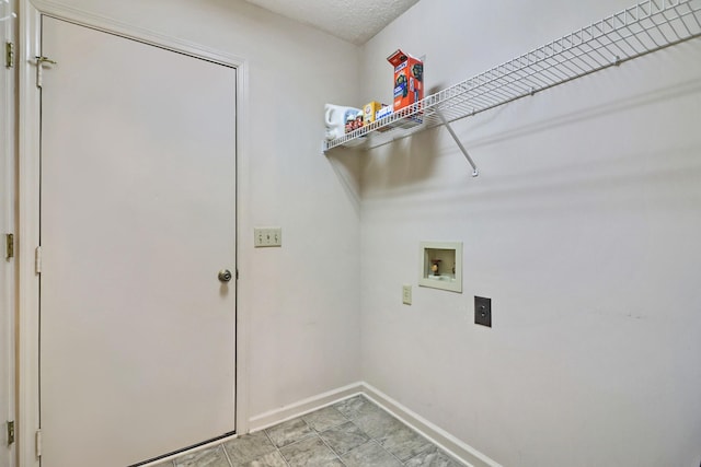 laundry area with washer hookup, laundry area, electric dryer hookup, and baseboards