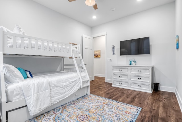 bedroom featuring ceiling fan and dark wood-type flooring