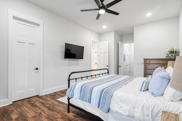 bedroom with ceiling fan and dark wood-type flooring