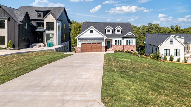 view of front of home with a front lawn and a garage