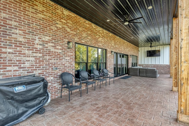 view of patio featuring ceiling fan, grilling area, and outdoor lounge area