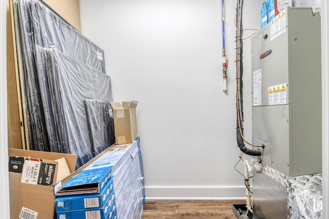 utility room with heating unit