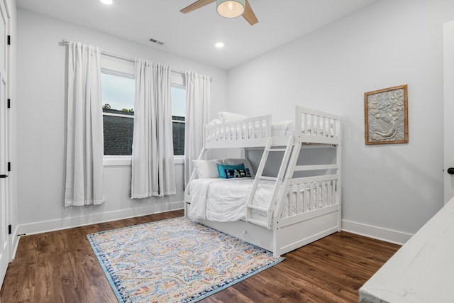 bedroom featuring dark hardwood / wood-style floors and ceiling fan