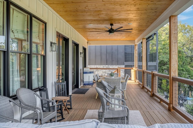 wooden deck with ceiling fan