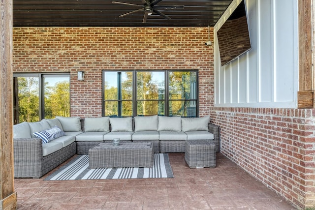 unfurnished living room with brick wall