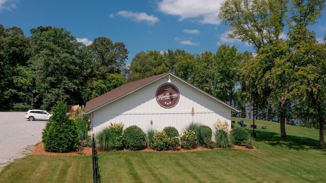 view of home's exterior with a lawn