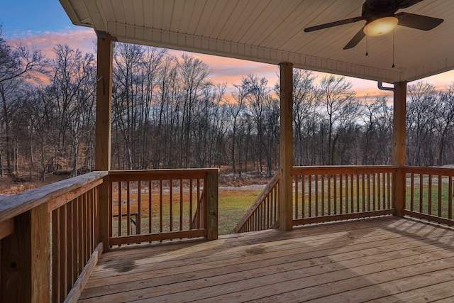 deck at dusk with ceiling fan