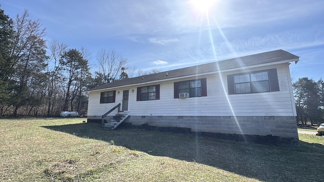 view of front of house with a front lawn