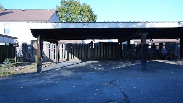 exterior space featuring a carport