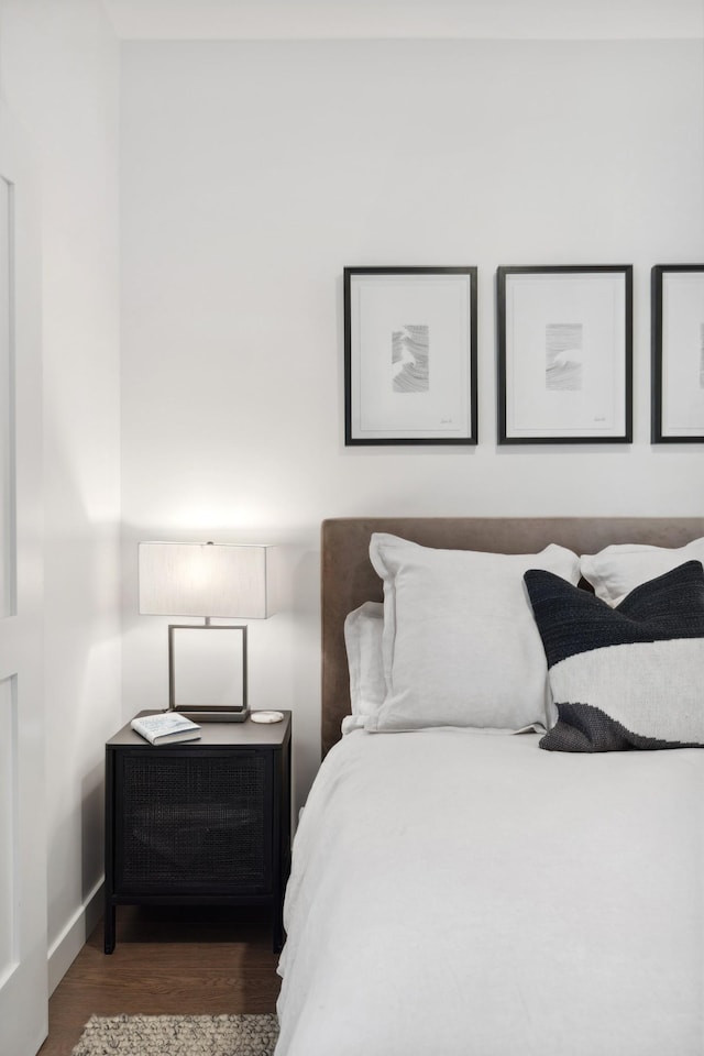 bedroom featuring dark hardwood / wood-style floors