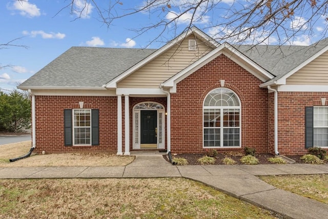 view of front of home with a front lawn