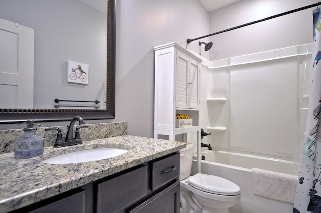 full bathroom featuring toilet, vanity, and shower / bath combination with curtain