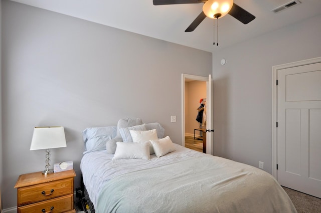 carpeted bedroom featuring ceiling fan