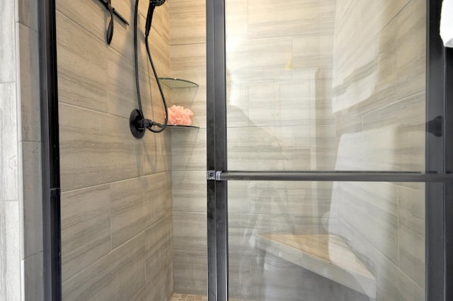 bathroom featuring an enclosed shower