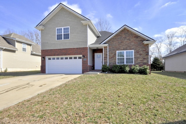 front of property with a front yard and a garage