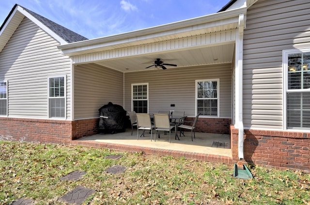 view of patio featuring ceiling fan