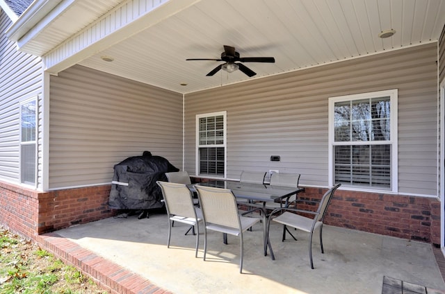 view of patio / terrace with ceiling fan and grilling area