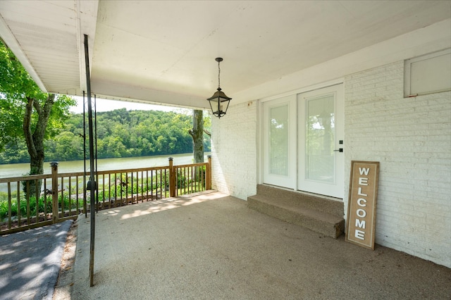 view of patio / terrace featuring a water view