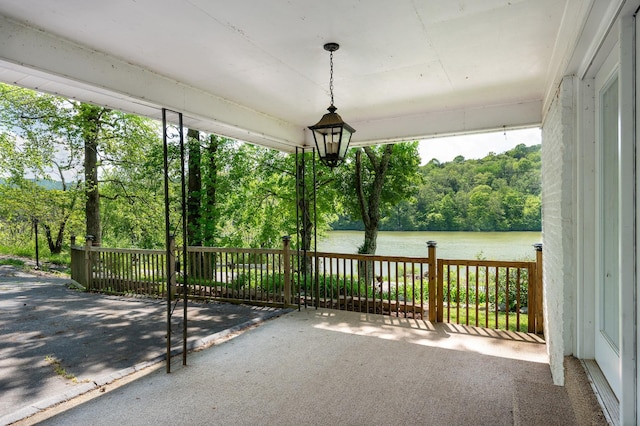 view of patio / terrace with a water view