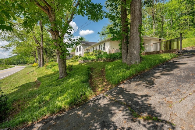 view of side of home with fence