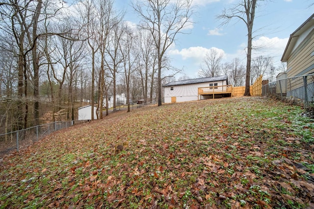 view of yard with a wooden deck