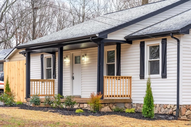 entrance to property with covered porch