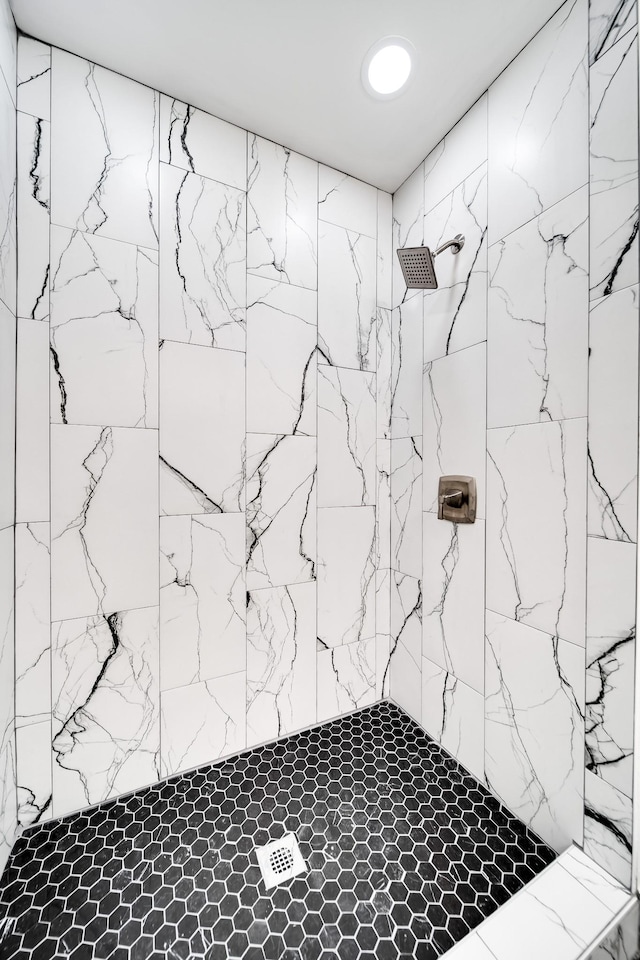 interior space with a tile shower