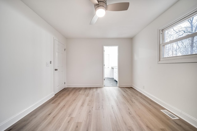 unfurnished room featuring ceiling fan and light hardwood / wood-style flooring