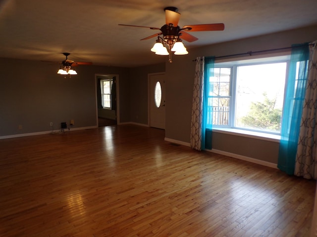 interior space featuring ceiling fan and wood-type flooring