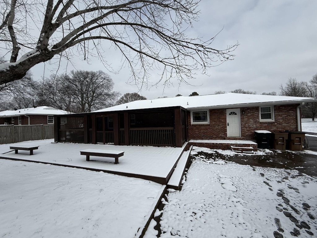 view of snow covered property