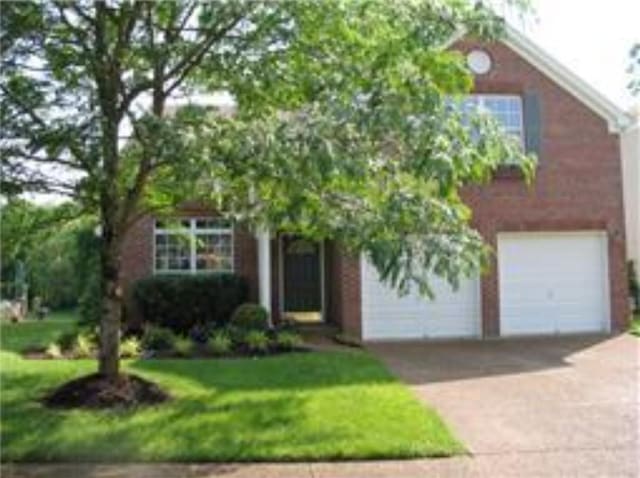 view of front of house with a front lawn