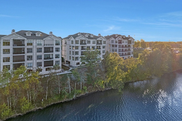 view of building exterior featuring a water view