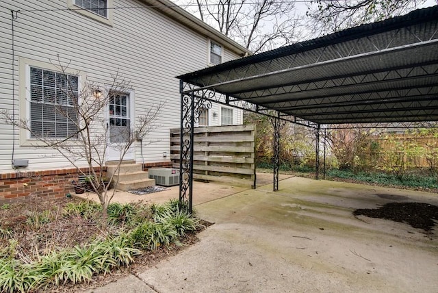 view of property exterior featuring a carport