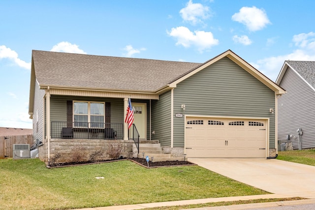 view of front of home with a front lawn, central air condition unit, a garage, and a porch