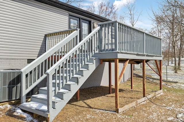 exterior space with a deck and cooling unit