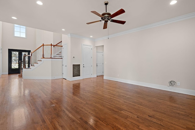 unfurnished living room with ornamental molding, hardwood / wood-style flooring, and ceiling fan