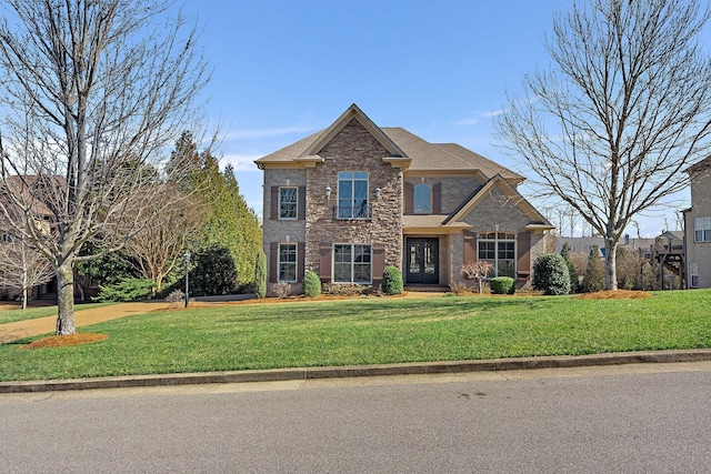 view of front of home featuring a front lawn