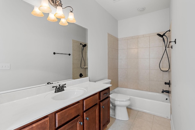 full bathroom with tile patterned floors, an inviting chandelier, toilet, vanity, and tiled shower / bath combo