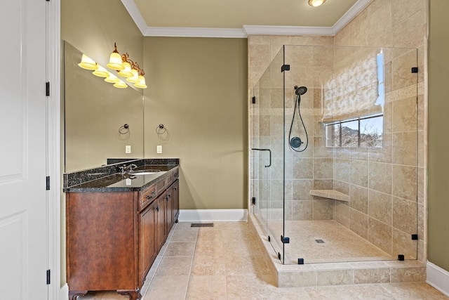 bathroom with ornamental molding, a shower with door, tile patterned flooring, and vanity