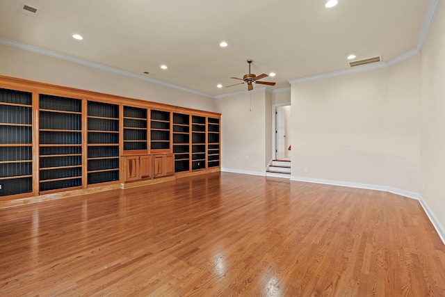 unfurnished living room featuring ornamental molding, hardwood / wood-style flooring, and ceiling fan