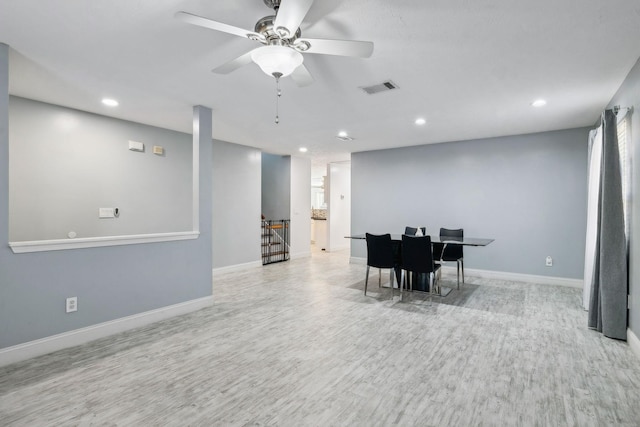 interior space with light hardwood / wood-style flooring and ceiling fan