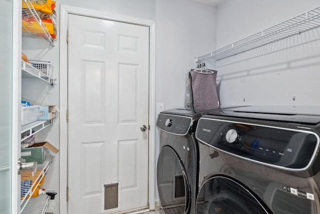 laundry area featuring washer and clothes dryer