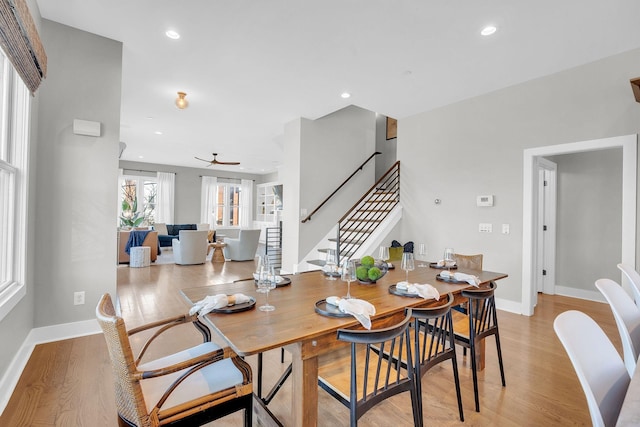 dining area with light hardwood / wood-style flooring