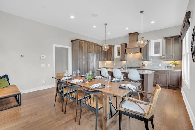 dining room featuring light wood-type flooring