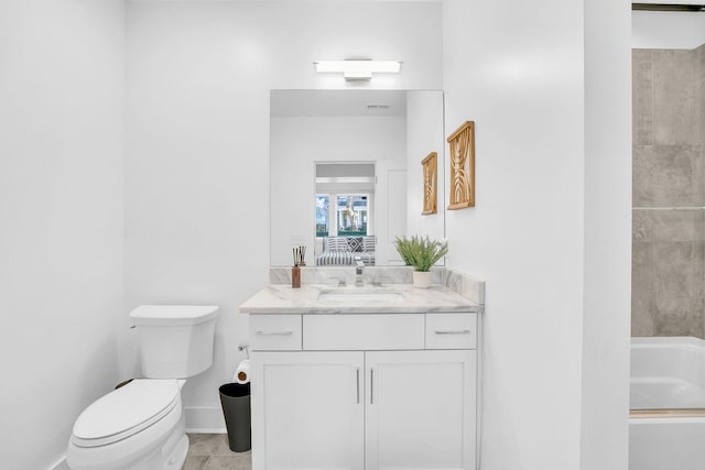 bathroom featuring vanity, toilet, and walk in shower