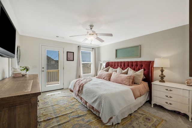 bedroom featuring ceiling fan, crown molding, access to exterior, and light colored carpet