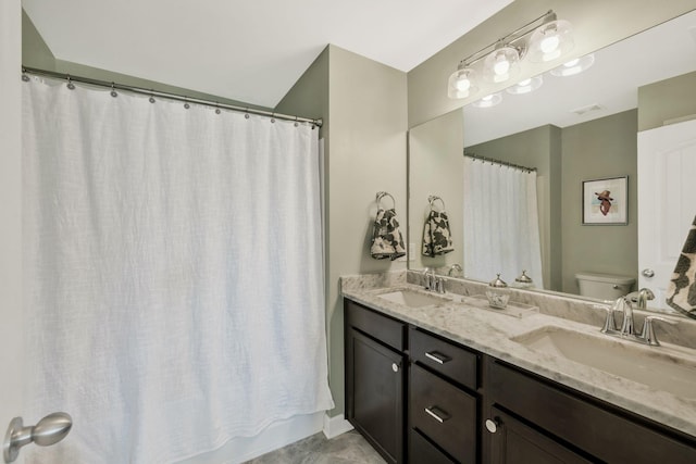 full bathroom featuring toilet, shower / bathtub combination with curtain, and vanity