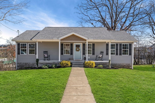 view of front of house with a front lawn and a porch