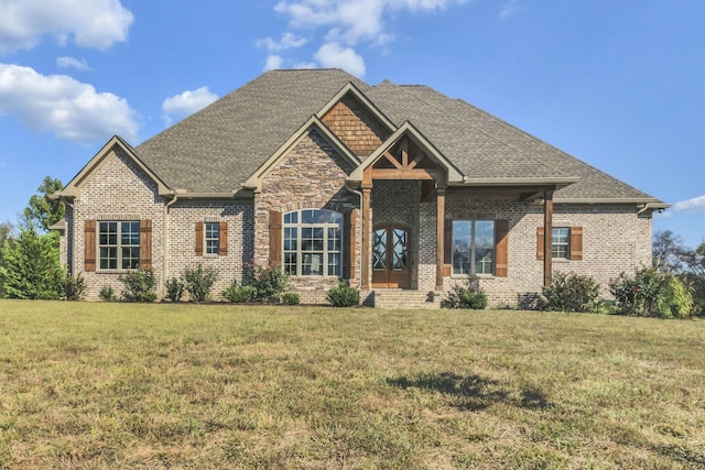 craftsman-style home with a front lawn