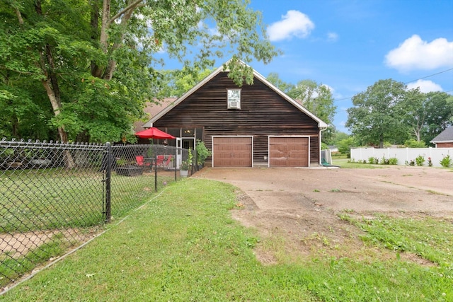 exterior space with a lawn and an outbuilding